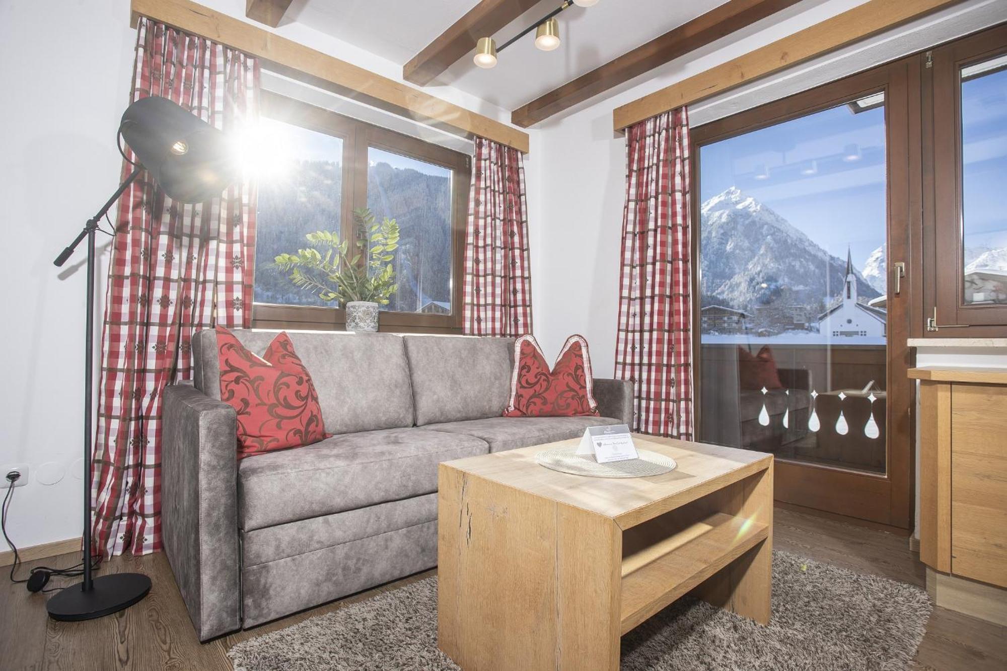 Alpenherz Ferienwohnungen ペルティサウ エクステリア 写真
